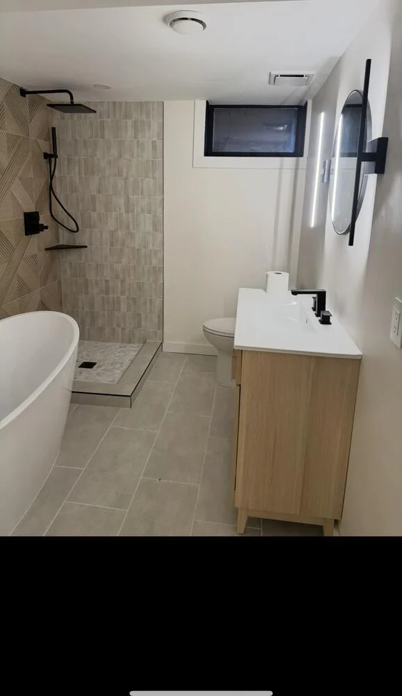 Thoughtful tilework and clean details turn a practical space into a personal retreat.